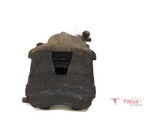 Gebruikte Remklauw (Tang) links-voor Volkswagen Polo V (6R) 1.6 TDI 16V 90 Prijs € 3,50 Margeregeling aangeboden door Focus Automotive