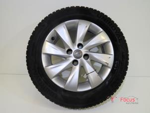 Gebruikte Velg + Winterband Opel Corsa E 1.2 16V Prijs € 65,00 Margeregeling aangeboden door Focus Automotive