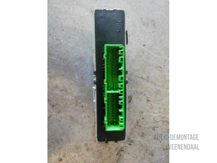 Centrallåsmodul från en Volvo V40 (VW) 1.9 D 2004