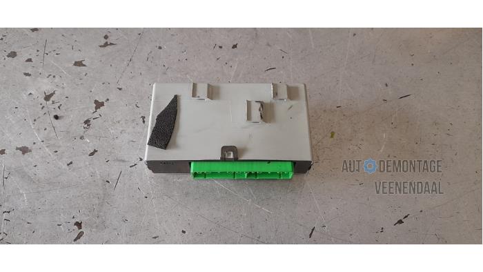 Centrallåsmodul från en Volvo V40 (VW) 1.8 16V 2003