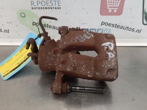 Begagnade Bakre bromsok, höger Renault Scénic I (JA) 1.4 16V Pris € 25,00 Marginaltabell erbjuds av Autodemontagebedrijf R. Poeste B.V.