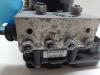 ABS Pumpe van een Volkswagen Polo V (6R) 1.2 12V BlueMotion Technology 2012