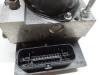 ABS Pumpe van een Volkswagen Polo V (6R) 1.2 12V BlueMotion Technology 2012