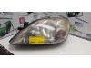 Strålkastare, vänster från en Nissan Primera Wagon (W12) 1.8 16V 2005