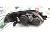 Strålkastare, vänster från en Nissan Primera Wagon (W12) 1.8 16V 2005