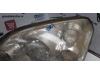 Strålkastare, vänster från en Nissan Primera Wagon (W12) 1.8 16V 2005