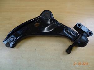 Używane Wahacz zawieszenia lewy przód Mini Mini (R56) 1.6 16V Cooper Cena € 35,70 Z VAT oferowane przez Miniparts24 - Miniteile24 GbR