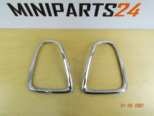 Gebruikte Achterlichtrand links Mini Mini (R56) 1.6 16V Cooper S Prijs € 59,38 Inclusief btw aangeboden door Miniparts24 - Miniteile24 GbR