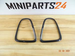 Gebruikte Achterlichtrand links Mini Mini (R56) 1.6 16V John Cooper Works Prijs € 29,75 Inclusief btw aangeboden door Miniparts24 - Miniteile24 GbR