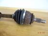 Drivaxel, vänster fram från en MINI Mini (R56) 1.6 16V John Cooper Works 2011