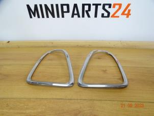 Gebruikte Achterlichtrand links Mini Mini (R56) 1.6 16V Cooper S Prijs € 59,38 Inclusief btw aangeboden door Miniparts24 - Miniteile24 GbR