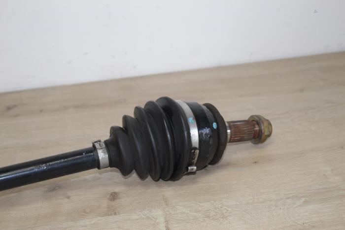 Drivaxel, vänster fram från en MINI Mini Open (R52) 1.6 16V Cooper S 2005