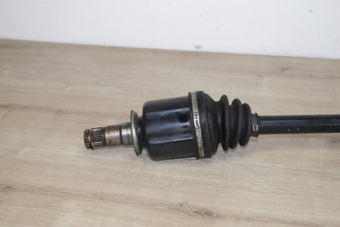 Drivaxel, vänster fram från en MINI Mini Open (R52) 1.6 16V Cooper S 2005