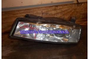 Begagnade Strålkastare, vänster Opel Calibra 2.0i 16V Ecotec Pris € 18,00 Marginaltabell erbjuds av Hans Auto Onderdelen