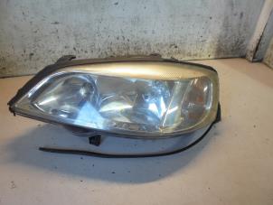 Begagnade Strålkastare, vänster Opel Astra G (F08/48) 1.6 Pris € 25,00 Marginaltabell erbjuds av Hans Auto Onderdelen
