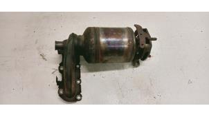 Używane Kolektor wydechowy + katalizator Volkswagen Polo V (6R) 1.2 12V Cena € 195,00 Procedura marży oferowane przez Hans Auto Onderdelen