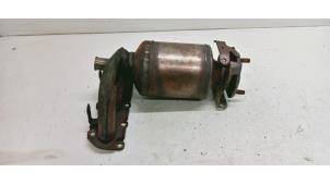 Używane Kolektor wydechowy + katalizator Volkswagen Polo V (6R) 1.2 12V Cena € 195,00 Procedura marży oferowane przez Hans Auto Onderdelen