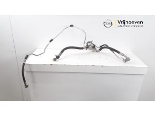 Begagnade Luftkonditioneringsledning Opel Zafira (M75) 2.2 16V Direct Ecotec Pris € 40,00 Marginaltabell erbjuds av Autodemontage Vrijhoeven B.V.