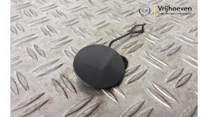 Gebruikte Afdekkap Sleepoog voor Opel Corsa F (UB/UH/UP) 1.2 Turbo 12V 100 Prijs € 10,00 Margeregeling aangeboden door Autodemontage Vrijhoeven B.V.