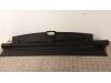 Dekzeil Bagageruimte van een Opel Astra H SW (L35) 1.7 CDTi 16V 2008