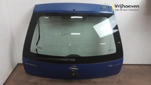 Używane Tylna klapa Opel Corsa C (F08/68) 1.2 16V Twin Port Cena € 75,00 Procedura marży oferowane przez Autodemontage Vrijhoeven B.V.