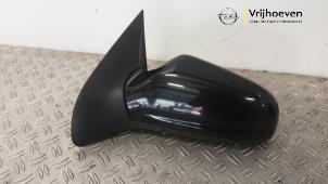 Gebruikte Buitenspiegel links Opel Astra H GTC (L08) 1.6 16V Twinport Prijs € 60,00 Margeregeling aangeboden door Autodemontage Vrijhoeven B.V.