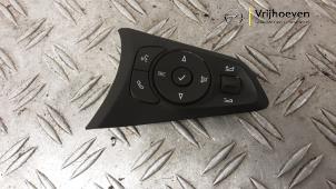 Gebruikte Radiobediening Stuur Opel Corsa F (UB/UH/UP) 1.2 Turbo 12V 100 Prijs € 25,00 Margeregeling aangeboden door Autodemontage Vrijhoeven B.V.