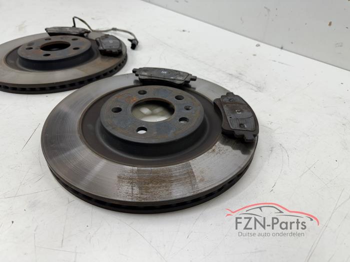 Remschijf + blok achter van een Audi A6 Avant (C8)  2021