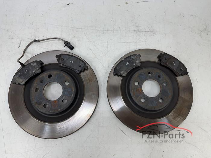 Remschijf + blok achter van een Audi A6 Avant (C8)  2021