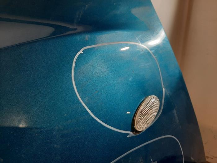 Framskärm, vänster från en Mazda 2 (DE) 1.3 16V MZR 2011