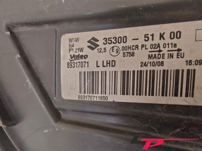 Strålkastare, vänster från en Suzuki Splash 1.0 12V 2009