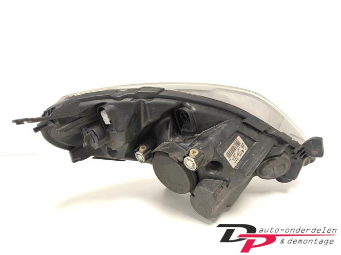 Strålkastare, vänster från en Suzuki Splash 1.0 12V 2009