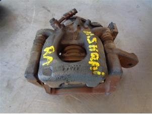 Używane Zacisk hamulcowy prawy tyl Nissan Qashqai (J11) Cena na żądanie oferowane przez Autohandel-Smet Gebroeders NV