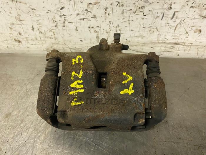 Remklauw (Tang) links-voor van een Mazda 3 (BM/BN) 2.2 SkyActiv-D 150 16V 2014