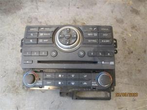 Gebruikte Airco bedieningspaneel Nissan Navara (D40) 2.5 dCi 16V Prijs op aanvraag aangeboden door Autohandel-Smet Gebroeders NV