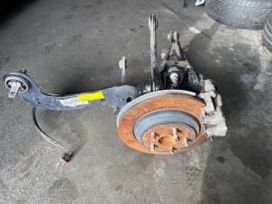 Begagnade Bakre upphängning, vänster Ford Focus 4 Wagon 1.0 Ti-VCT EcoBoost 12V 125 Pris € 300,00 Marginaltabell erbjuds av Express Autodemontage