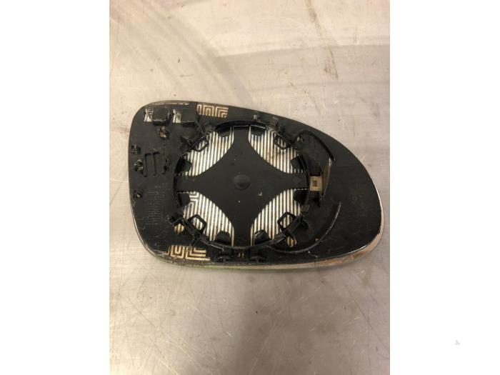 Spiegelglas links van een Volkswagen Golf V Variant (1K5) 1.4 TSI 140 16V 2008