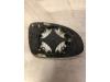 Spiegelglas links van een Volkswagen Golf V Variant (1K5) 1.4 TSI 140 16V 2008