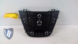 Gebruikte Radiobedienings paneel Opel Insignia 1.8 16V Ecotec Prijs € 36,30 Inclusief btw aangeboden door Vollux Carparts B.V.
