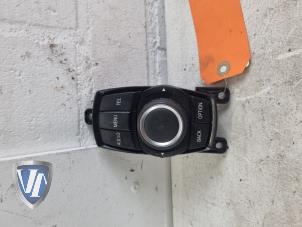 Gebruikte Radiobedienings paneel BMW 1 serie (F20) 116d 1.6 16V Efficient Dynamics Prijs € 90,75 Inclusief btw aangeboden door Vollux Carparts B.V.