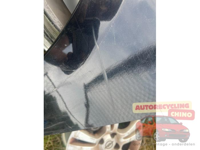 Framskärm, vänster från en Mazda 2 (NB/NC/ND/NE) 1.4 16V 2003