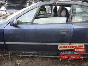 Begagnade Dörr, 2-dörrars, vänster Opel Calibra 2.0i 16V Pris € 60,00 Marginaltabell erbjuds av Autorecycling Chino B.V.