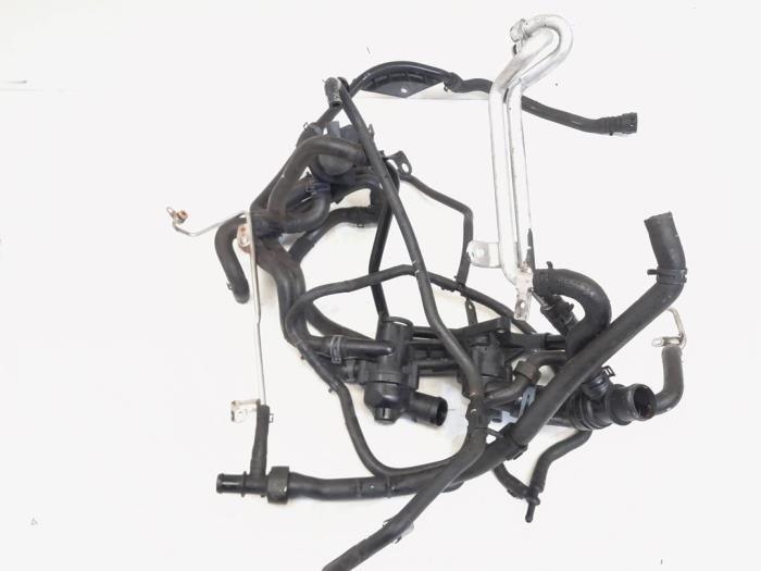 Termostathus från en Volkswagen Passat Variant (365) 1.4 TSI 16V 2010