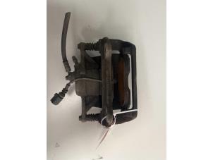 Używane Zacisk hamulcowy lewy tyl Seat Tarraco 2.0 TSI 16V 4Drive Cena € 70,00 Procedura marży oferowane przez DVZ Carparts