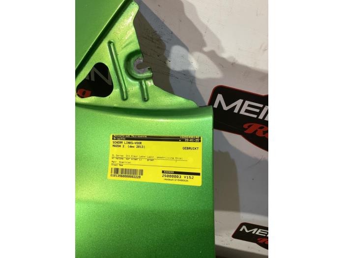 Framskärm, vänster från en Mazda 2 (DE) 1.3 16V MZR 2013