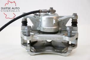 Używane Zacisk hamulcowy lewy przód Audi Q2 (GAB/GAG) 1.0 30 TFSI 12V Cena € 48,40 Z VAT oferowane przez Duitse Auto Onderdelen