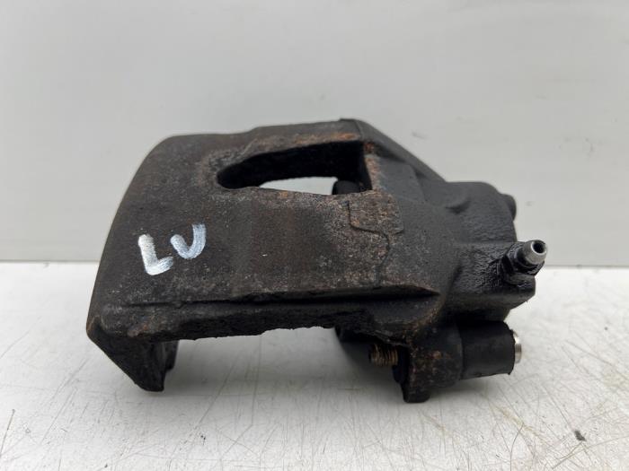 Främre bromsok, vänster från en Volkswagen Up! (121) 1.0 12V 60 2020