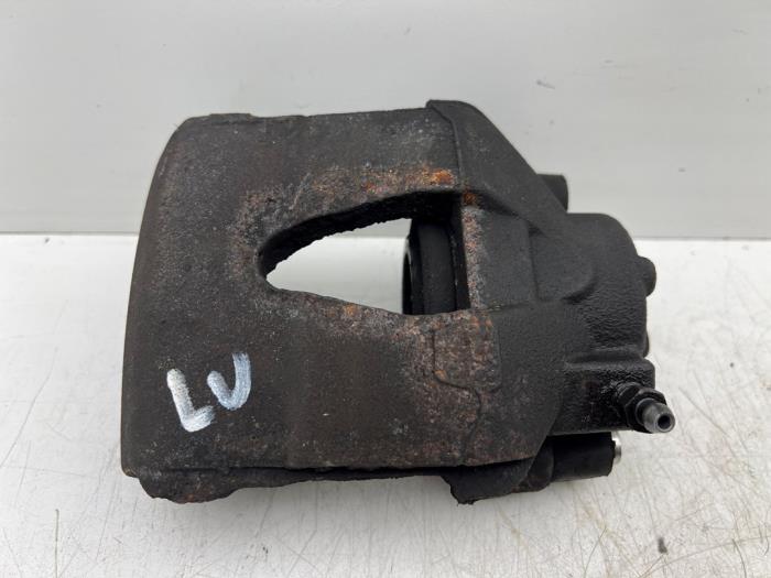 Främre bromsok, vänster från en Volkswagen Up! (121) 1.0 12V 60 2020