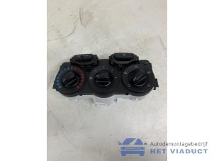 Begagnade Värmekontrollpanel Opel Adam 1.2 16V Pris € 35,00 Marginaltabell erbjuds av Het Viaduct