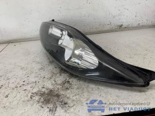 Used Headlight, left Ford Fiesta 6 (JA8) 1.25 16V Price € 150,00 Margin scheme offered by Het Viaduct